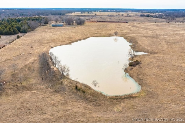 aerial view featuring a rural view and a water view