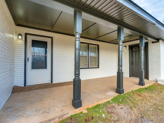 view of patio featuring a porch