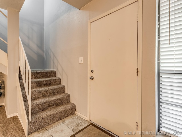 view of tiled foyer entrance