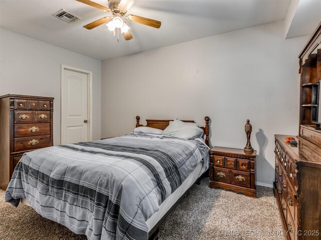 bedroom featuring ceiling fan and carpet floors