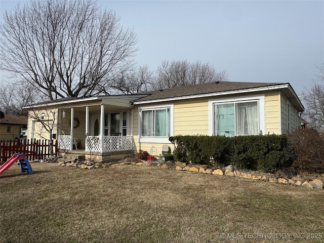 view of front of house featuring a front lawn and a porch