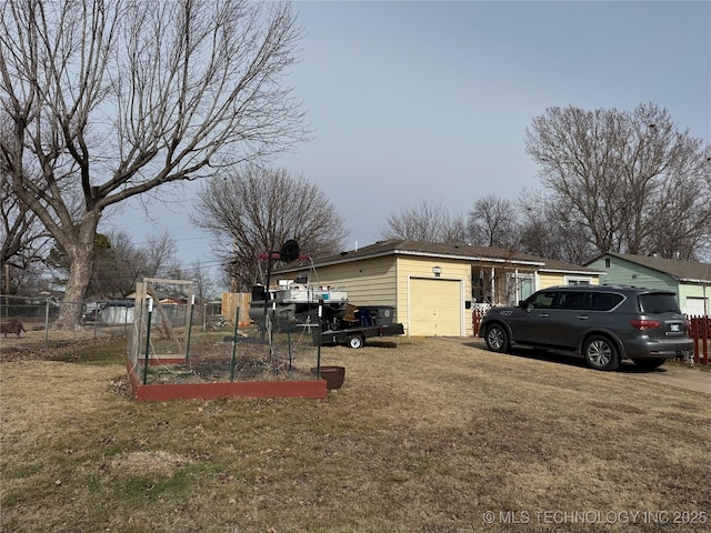 view of yard featuring a garage