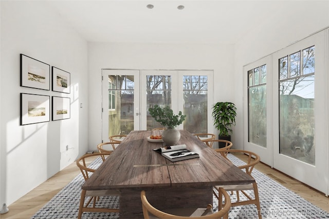 sunroom featuring french doors