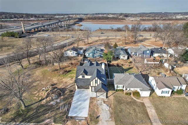 drone / aerial view featuring a water view