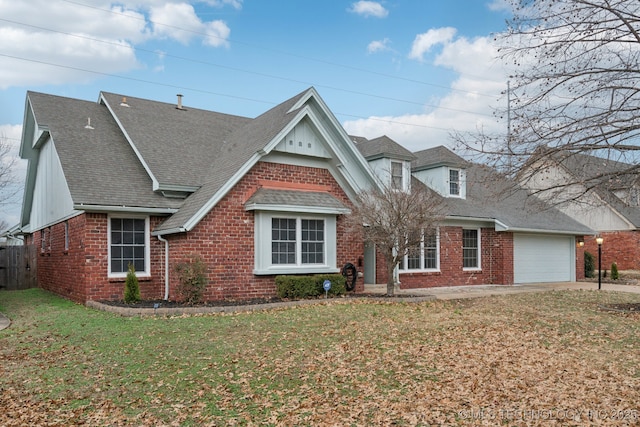 view of front facade with a front lawn and a garage