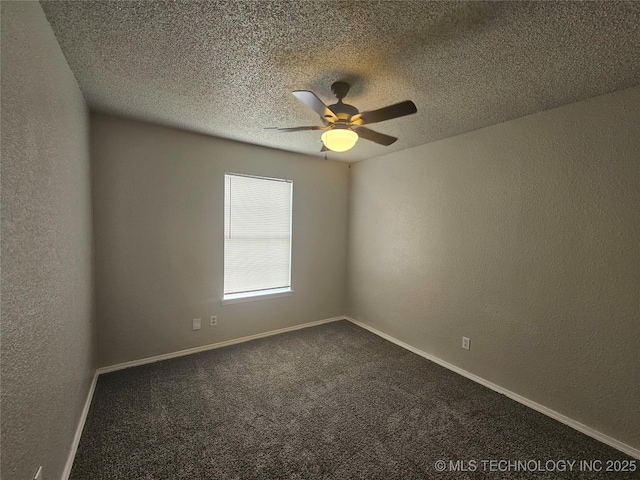 empty room featuring ceiling fan and carpet floors