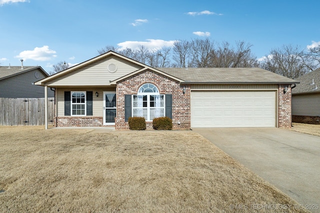 single story home with a front lawn and a garage