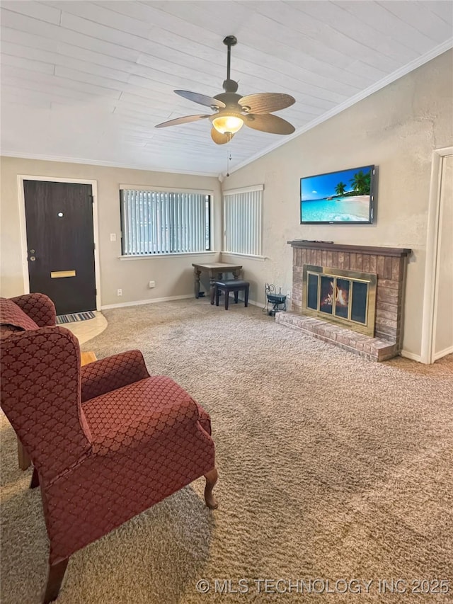 carpeted living room featuring a brick fireplace, wooden ceiling, crown molding, and ceiling fan