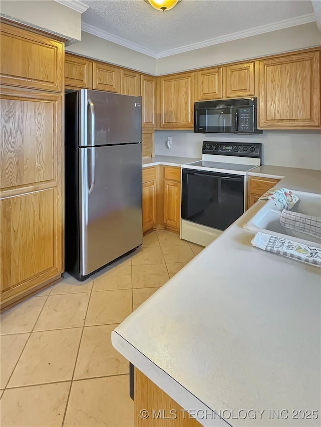 kitchen with stainless steel fridge, electric stove, light tile patterned flooring, a textured ceiling, and ornamental molding