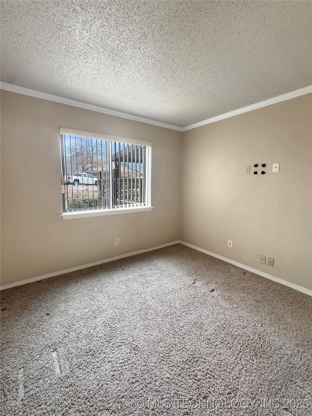 unfurnished room with a textured ceiling and ornamental molding