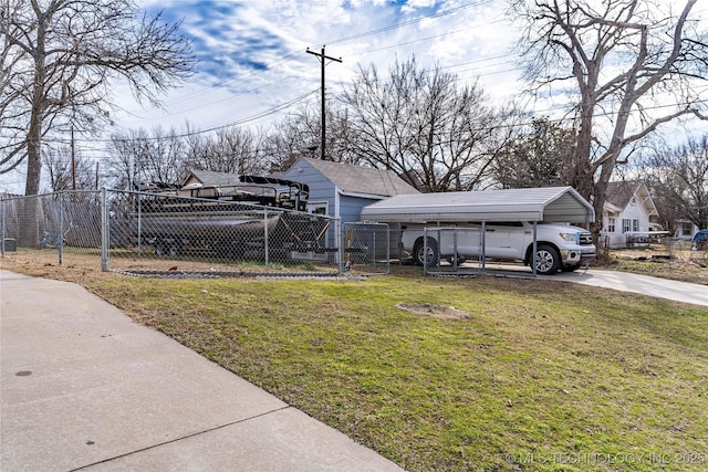 view of front of house featuring a front yard and a carport