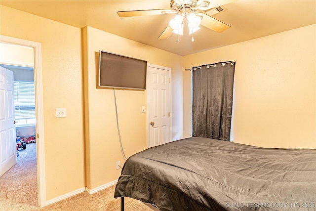 bedroom featuring ceiling fan and carpet floors