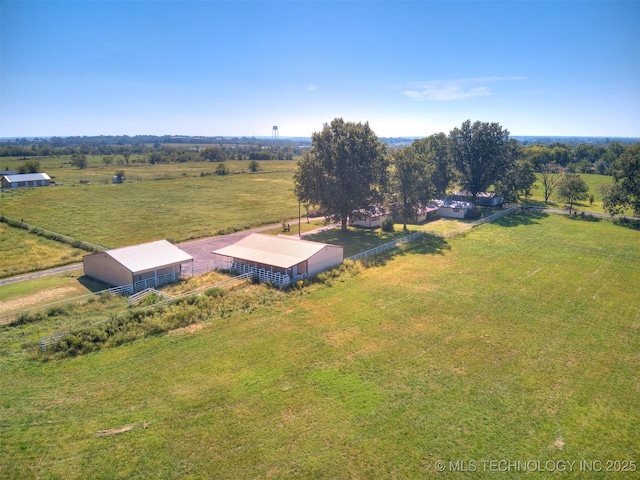 birds eye view of property featuring a rural view