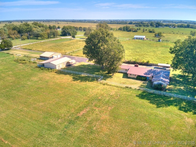 birds eye view of property featuring a rural view