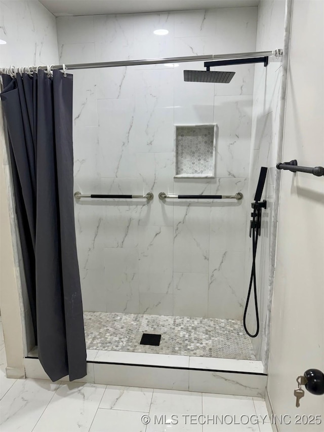 bathroom with a shower with shower curtain