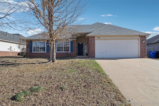 ranch-style home featuring a garage