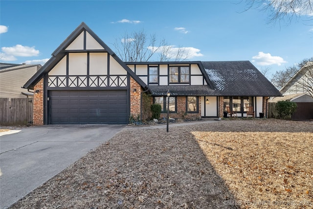 tudor home featuring a garage