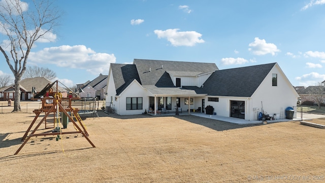 exterior space featuring a patio and a playground