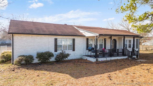 ranch-style home with covered porch