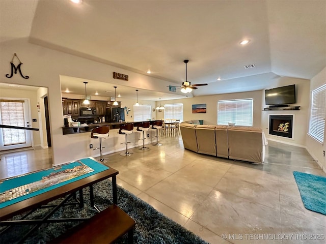 living room with ceiling fan