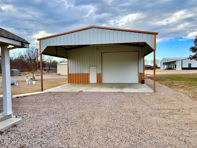 view of outdoor structure with a garage