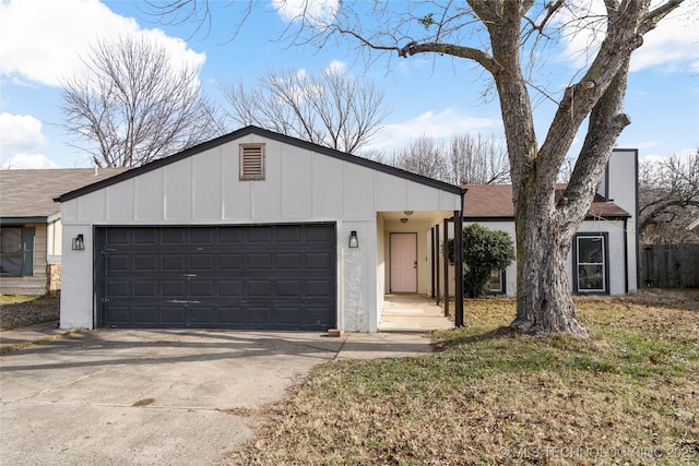 ranch-style house featuring a garage