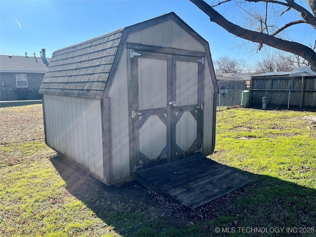 view of outdoor structure with a yard