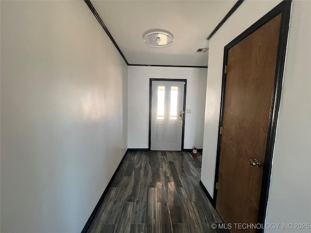 hallway featuring dark hardwood / wood-style floors