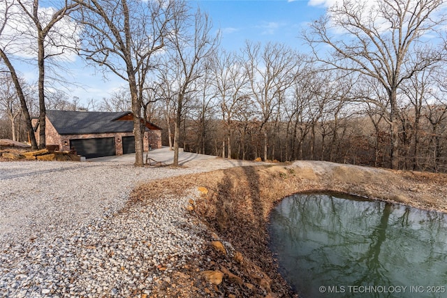 view of yard featuring a garage