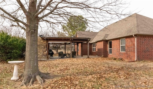 rear view of house with a patio area