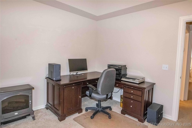 office space with light colored carpet