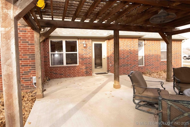 view of patio / terrace featuring ceiling fan and a pergola