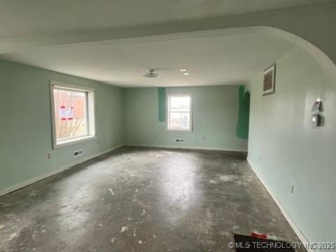 empty room featuring concrete floors