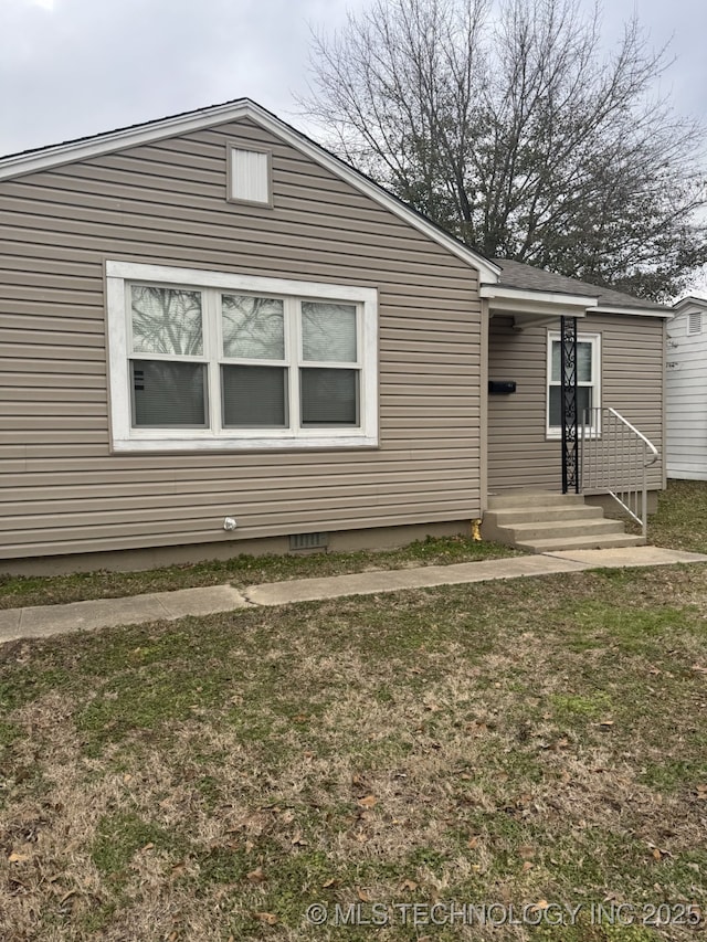 view of front of house with a front yard