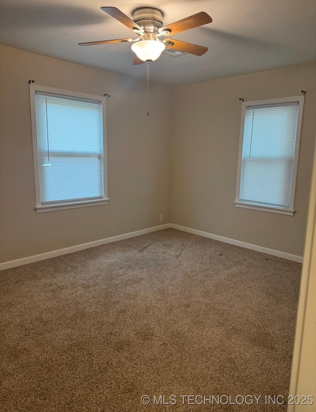 unfurnished room with carpet flooring