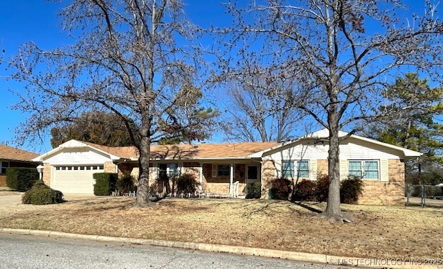 single story home with a garage