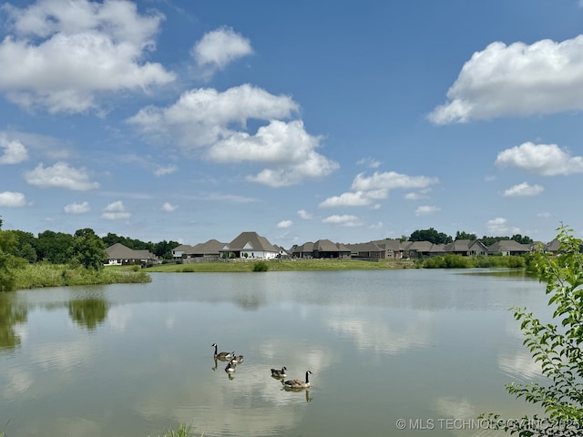 view of water feature with a residential view