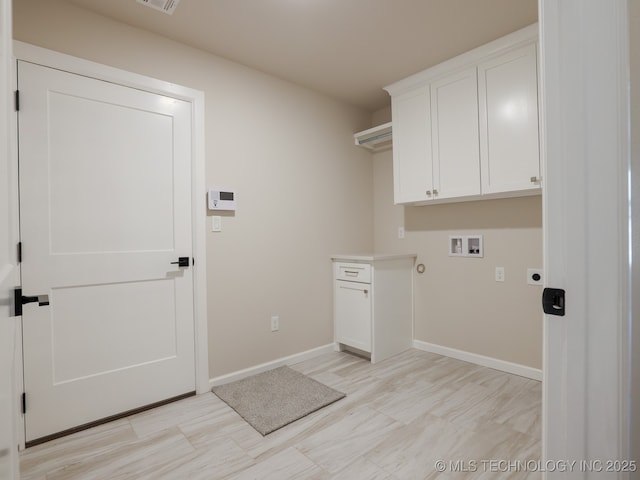 laundry area featuring hookup for an electric dryer, visible vents, cabinet space, baseboards, and hookup for a washing machine
