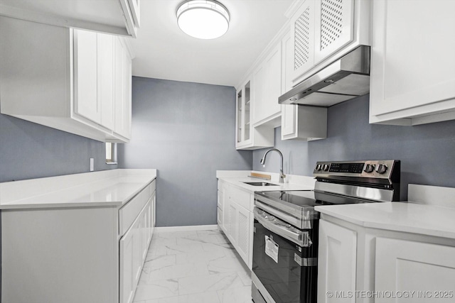 kitchen featuring sink, white cabinets, and stainless steel electric range