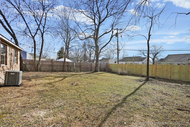 view of yard with central AC