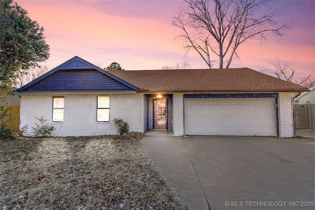 single story home with a garage