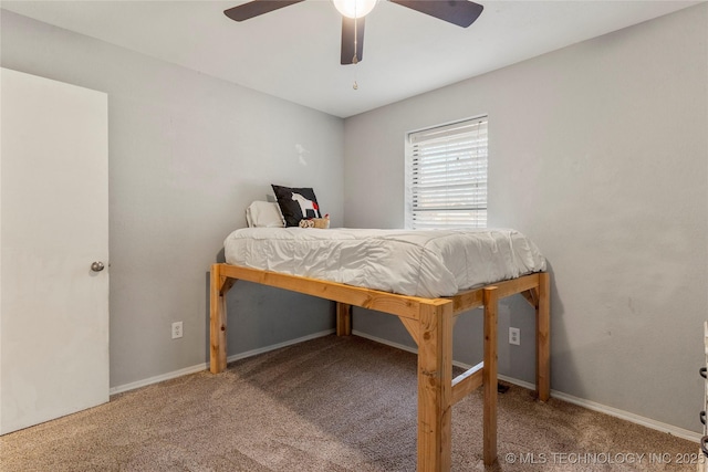 bedroom with ceiling fan and carpet flooring