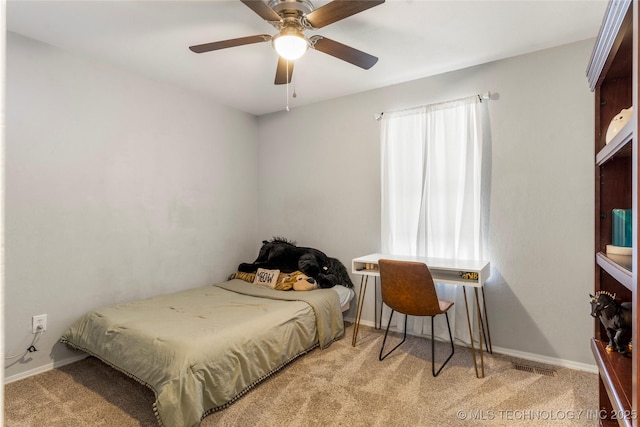 carpeted bedroom featuring ceiling fan