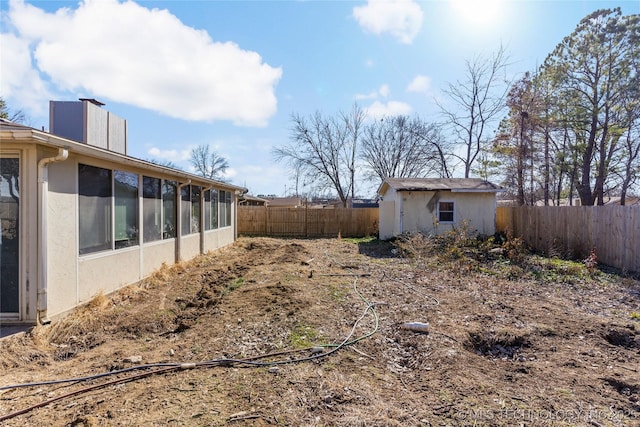 view of yard with a storage shed