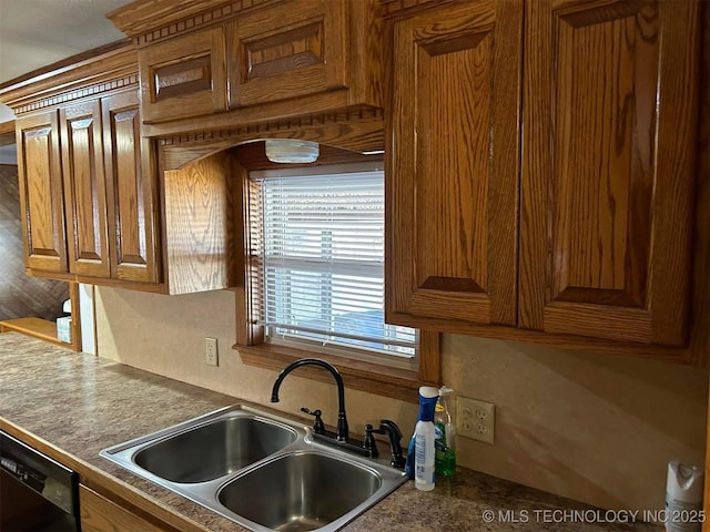 kitchen featuring sink and black dishwasher