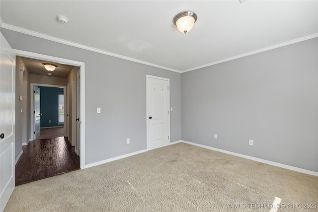 unfurnished room with light carpet and crown molding