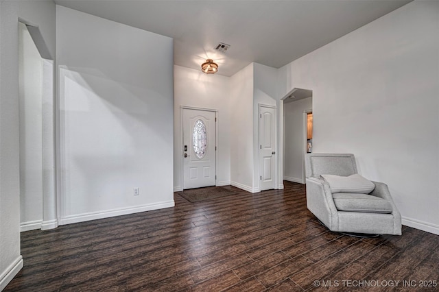 foyer entrance featuring dark hardwood / wood-style flooring