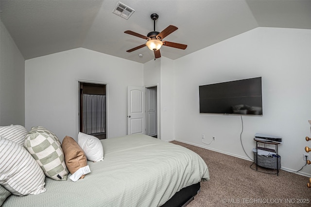 bedroom featuring carpet flooring, vaulted ceiling, and ceiling fan