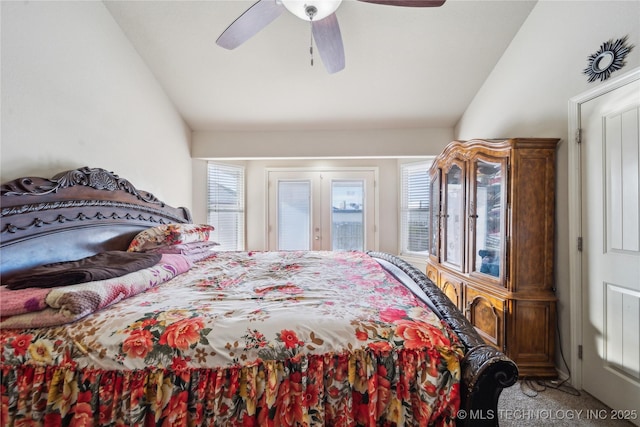 carpeted bedroom featuring lofted ceiling, access to outside, a ceiling fan, and french doors