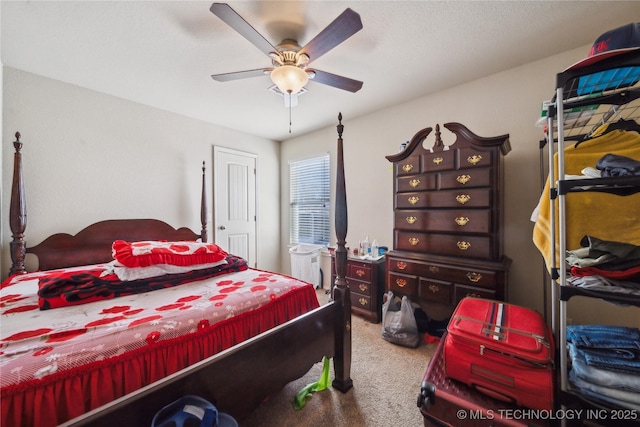 bedroom featuring a ceiling fan and carpet flooring